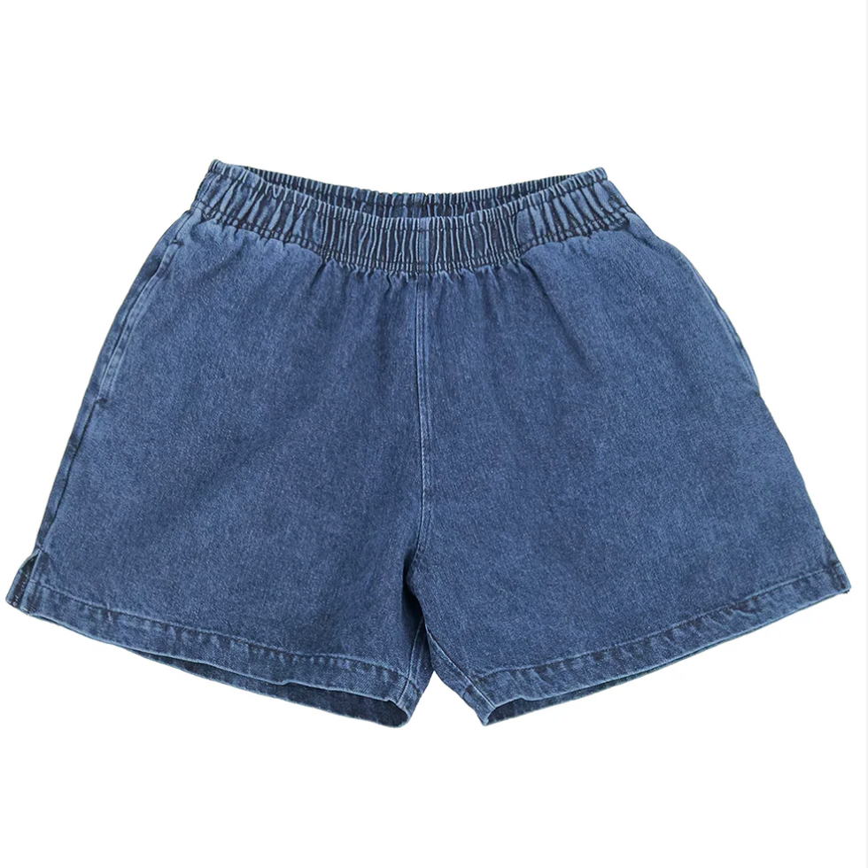 A pair of blue denim shorts with an elastic waistband and a drawstring, featuring two front slash pockets.