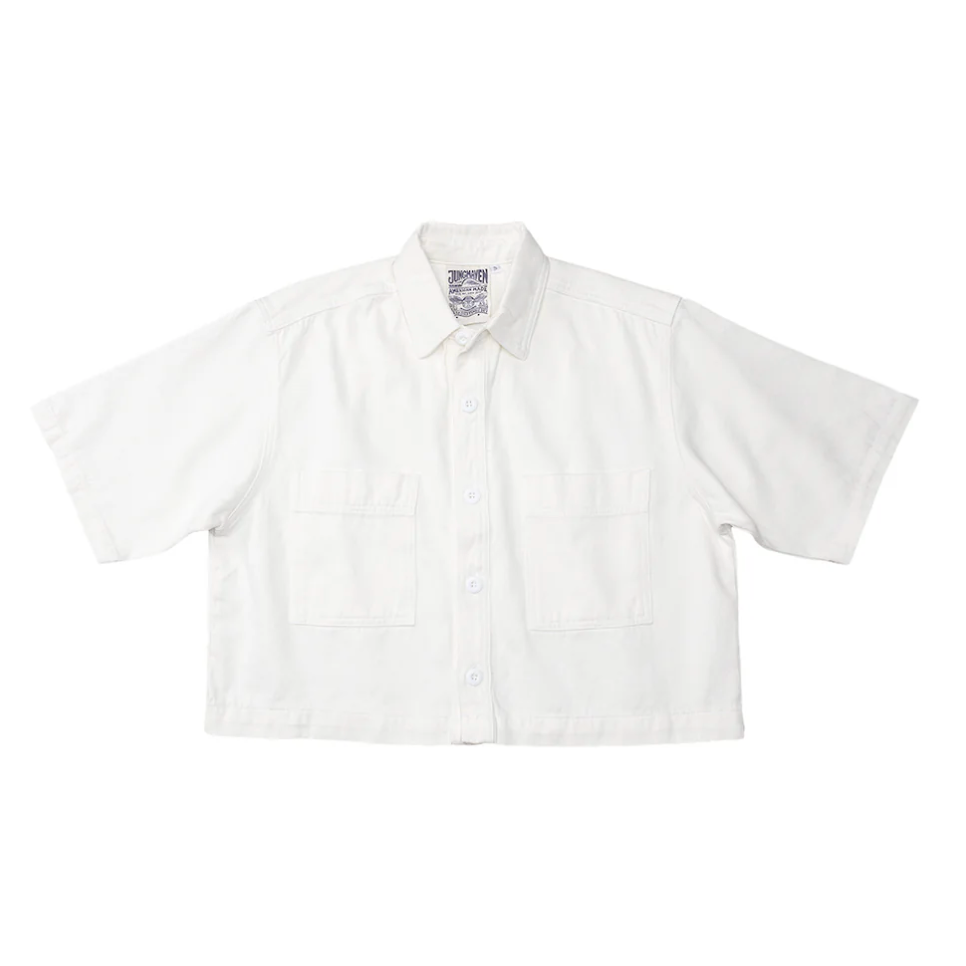 White short-sleeve women's jacket/shirt on a white background. made from organic textiles.
