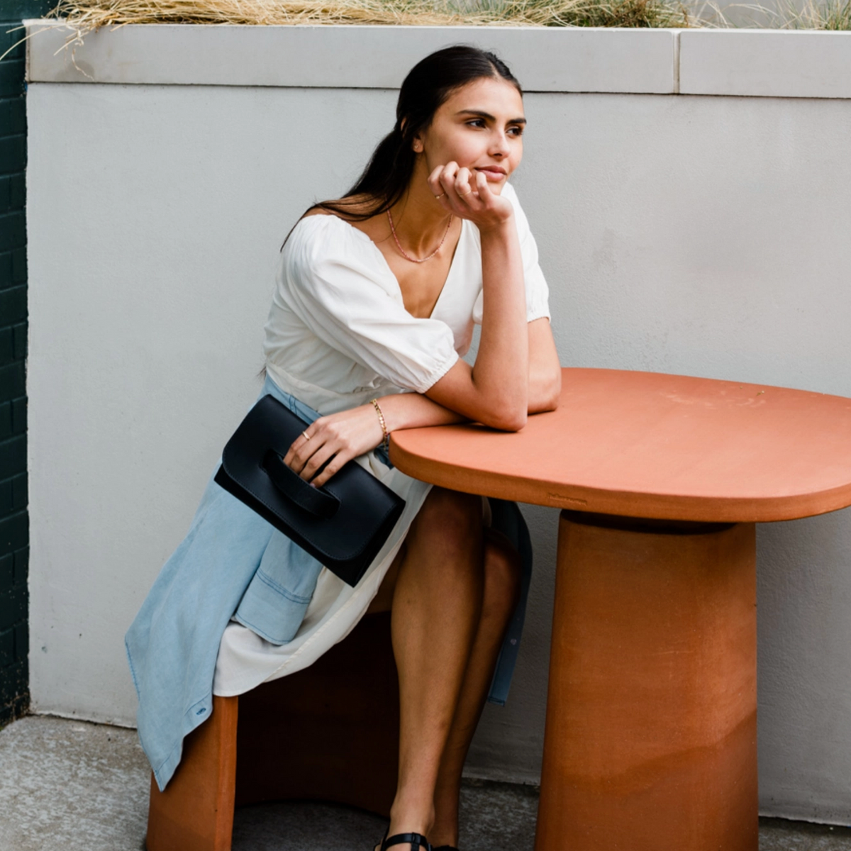 Mare Leather Hand Strap Clutch